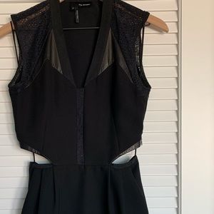 Black dress with open back/sides/with pockets
